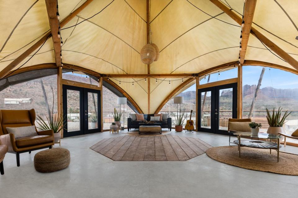 a tented room with a large glass ceiling