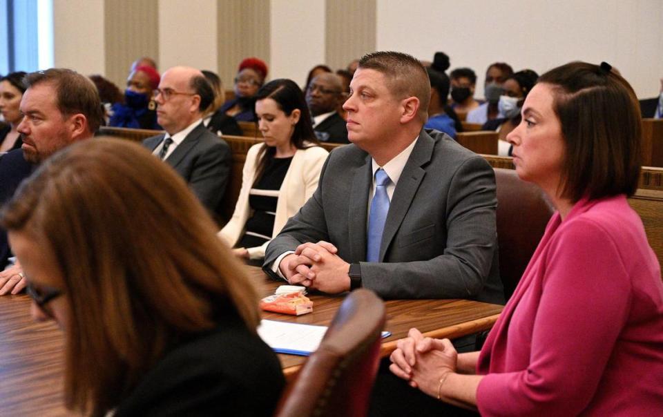 Former Kansas City police detective Eric DeValkenaere and his legal team hear his sentence at the the conclusion of his sentencing hearing Friday, May 4, 2022. DeValkenaere was sentenced to six years in the Dec. 3, 2019, killing of Cameon Lamb.