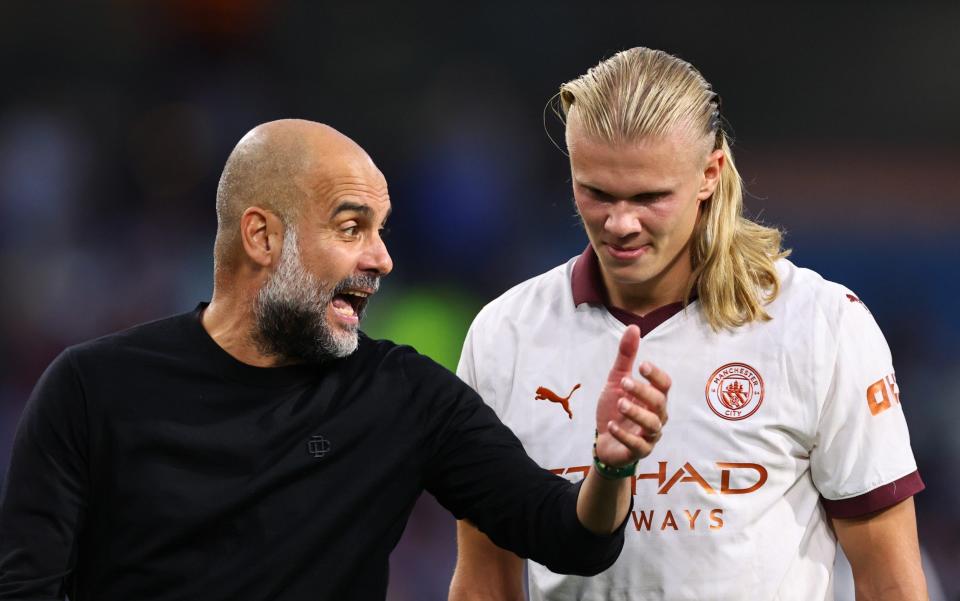 Pep Guardiola remonstrates with Man City striker Erling Haaland at Burnley