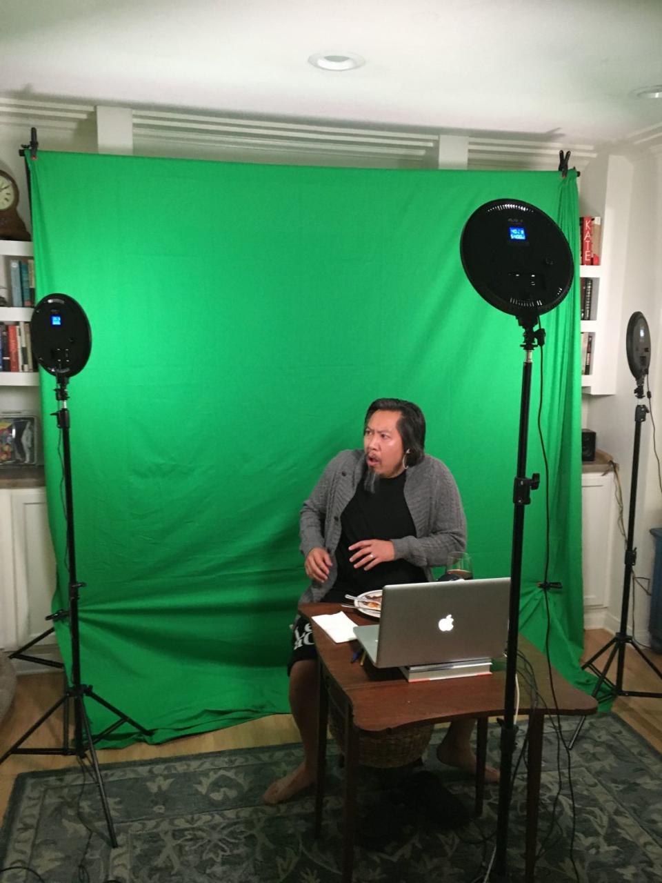 Feodor Chin performs online from his home during recording of the short play "A Fork in the Middle."