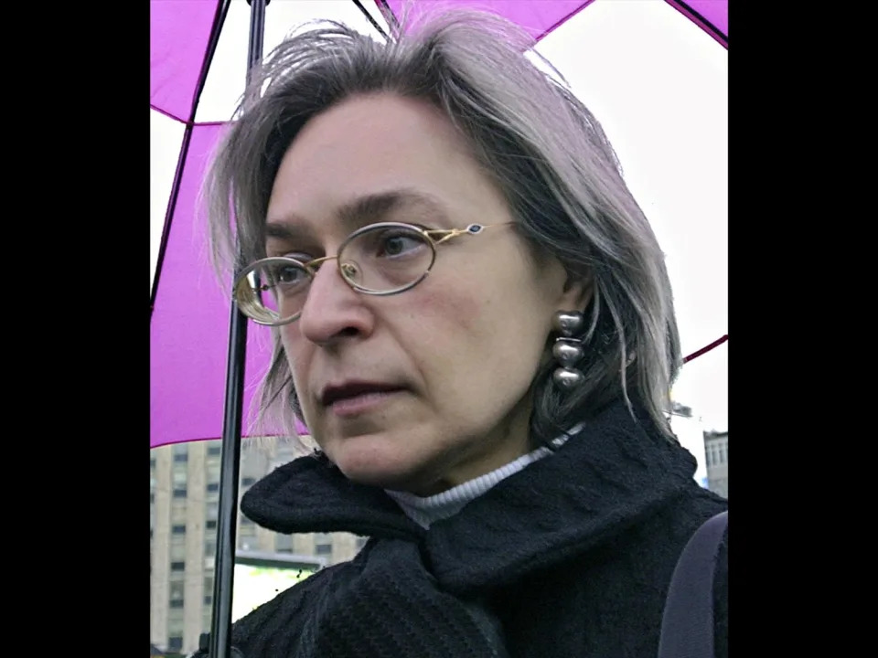 Anna Politkovskaya headshot, Russian journalist, photo on black