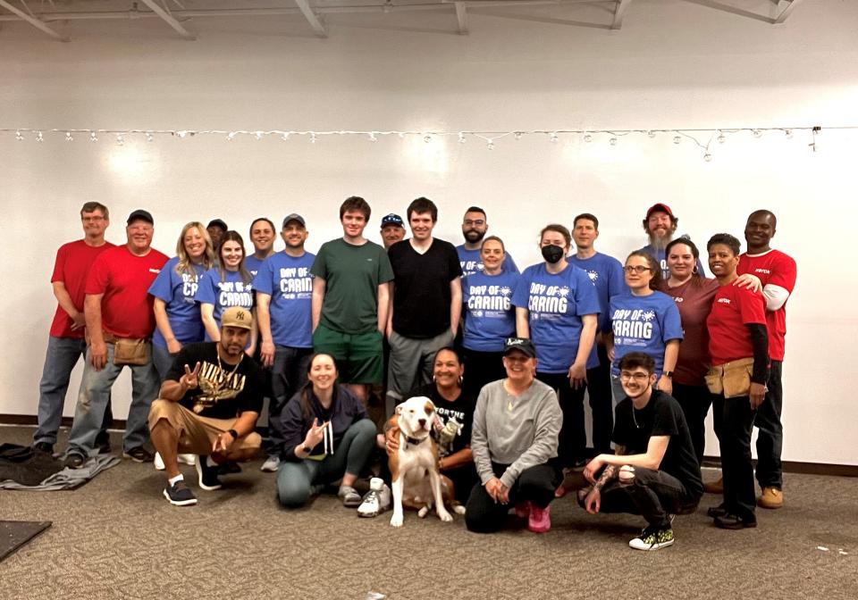 Community Resource Collaborative employees and supporters in 2023. Tina Paradiso is second from right in the front row.