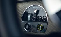 <p>Like Rolls-Royce vehicles of the past, the Cullinan's ignition and light switches are housed in a circular cutout to the left of the steering wheel.</p>