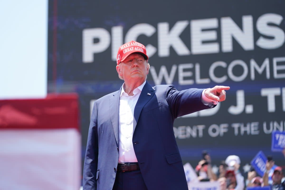 Former US President Donald Trump gestures to the crowd at a campaign event on July 1, 2023 in Pickens, South Carolina. (Getty Images)