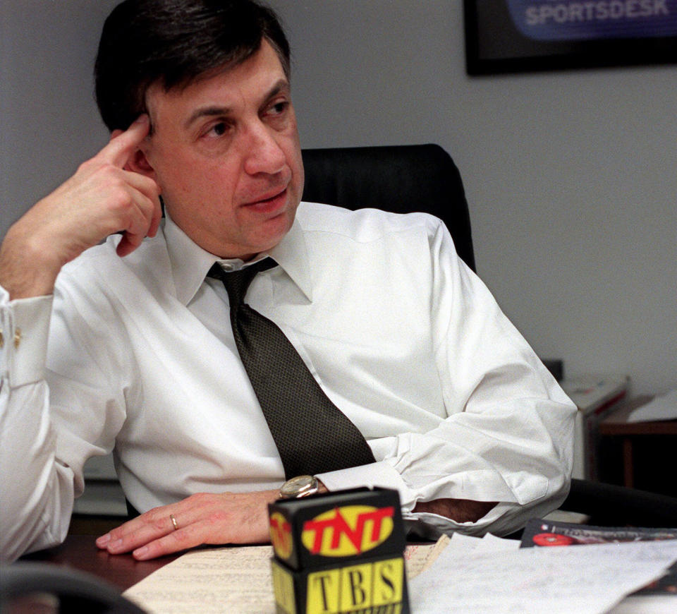 FILE - Marv Albert talks about his return to national television as a part of Turner Sports to call NBA games on the TNT cable network during an interview at New York's Madison Square Garden, in this Monday, Feb. 15, 1999, file photo. Marv Albert plans to retire following the NBA's Eastern Conference finals, ending a broadcasting career that has spanned nearly 60 years. “There is no voice more closely associated with NBA basketball than Marv Albert’s,” NBA Commissioner Adam Silver said in a statement released Monday, May 17, 2021, by Turner Sports. (AP Photo/Lynsey Addario, File)