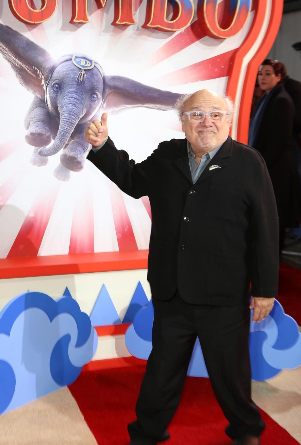 Star: Danny DeVito points to Dumbo behind him at the European premiere (Dave Benett)