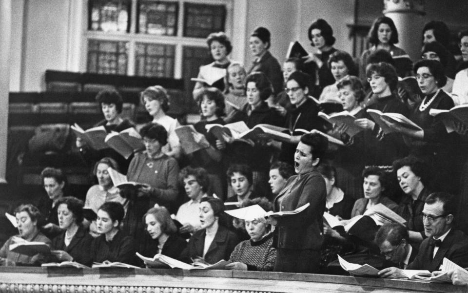 Russian operatic soprano Galina Vishnevskaya (standing, front row) with the Bach Choir during a recording session for War Requiem