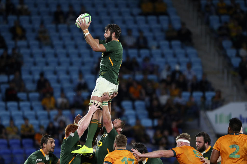 South Africa's Lood de Jager gathers a line out ball against Australia during their Rugby Championship match on Sunday, Sept. 12, 2021, Gold Coast, Australia. (AP Photo/Tertius Pickard)