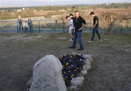 Gilad Sharon, the son of former Israeli Prime Minister Ariel Sharon visits the grave of his mother where Ariel Sharon is expected to be buried at Havat Shikmim, the family farm near Sderot, southern Israel January 11, 2014. REUTERS/Yotam Ronen