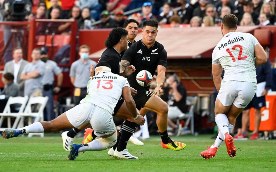 Quinn Tupaea of the All Blacks catches the ball during the 1874 rugby cup between the USA Eagles and New Zealand - AFP