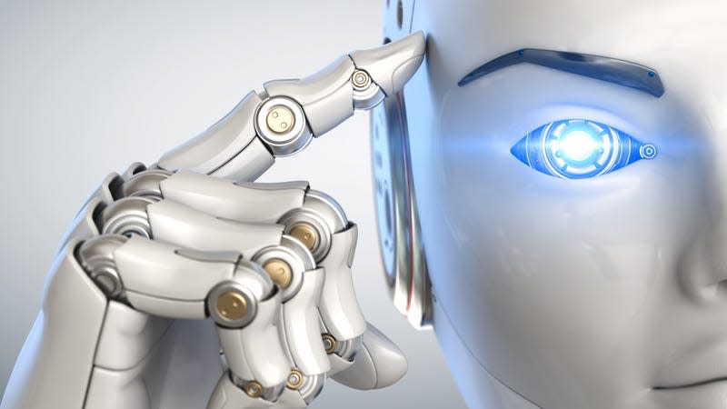 Stock image of robot hand and face