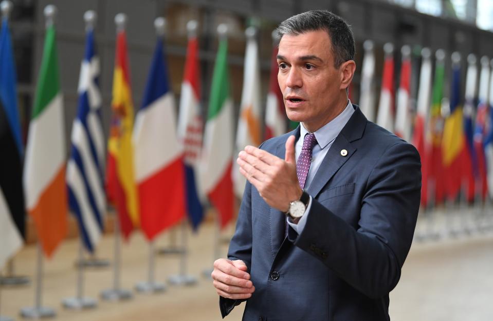 Spanish Prime Minister Pedro Sanchez talks to journalists as he arrives for an EU summit at the European Council building in Brussels, Thursday, June 24, 2021. At their summit in Brussels, EU leaders are set to take stock of coronavirus recovery plans, study ways to improve relations with Russia and Turkey, and insist on the need to develop migration partners with the countries of northern Africa, but a heated exchange over a new LGBT bill in Hungary is also likely. (John Thys, Pool Photo via AP)