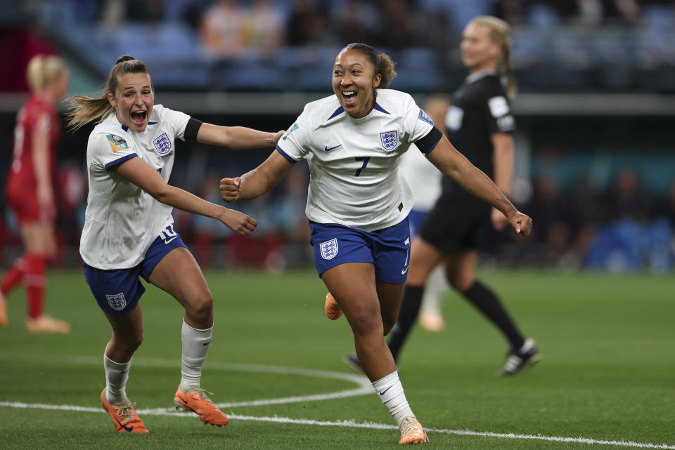 England's Lauren James, right, celebrates a first half goal with teammate England's Ella Toone during the Women's World Cup Group D soccer match between England and Denmark at Sydney Football Stadium in Sydney, Australia, Friday, July 28, 2023. (AP Photo/Sophie Ralph)