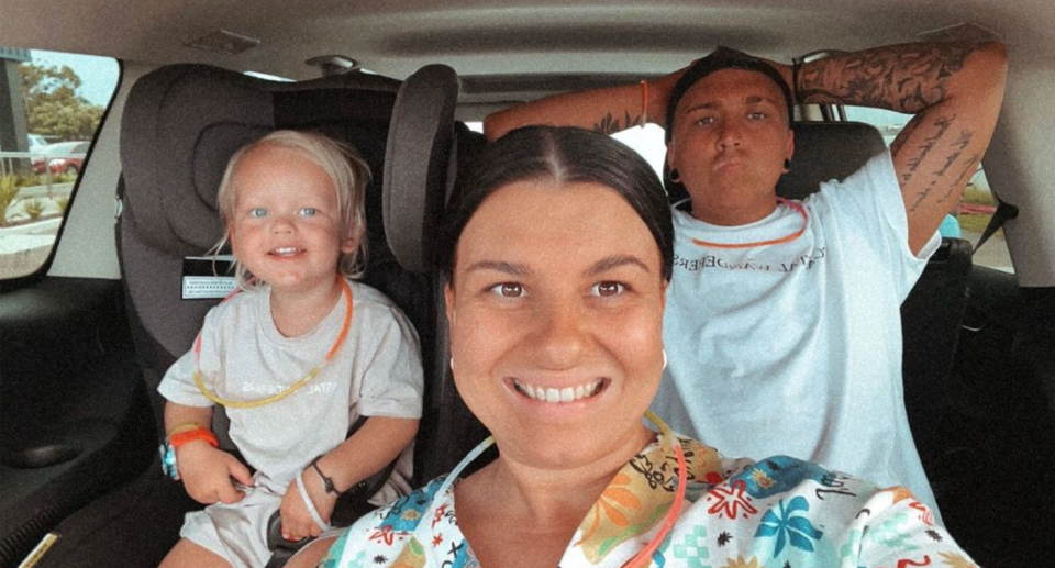 Kayla Heagney and Nicola Fox pictured smiling with their child before Bali holiday.