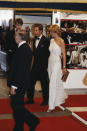 <p>Princess Diana wore a white sparkly one-shouldered Hatchi evening gown at the premiere of the James Bond film <em>Octopussy</em> in 1983. (Getty Images)</p> 