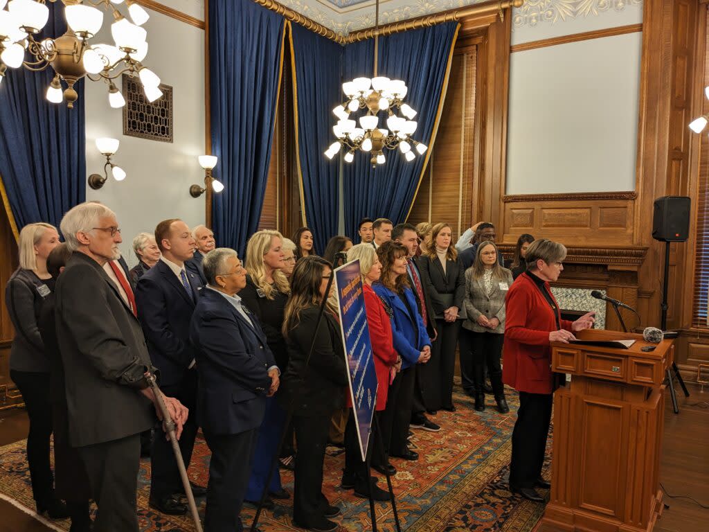 Gov. Laura Kelly and bipartisan group of legislators propose a property, sales and income tax reduction bill on the first day of the 2024 session. (Tim Carpenter/Kansas Reflector)