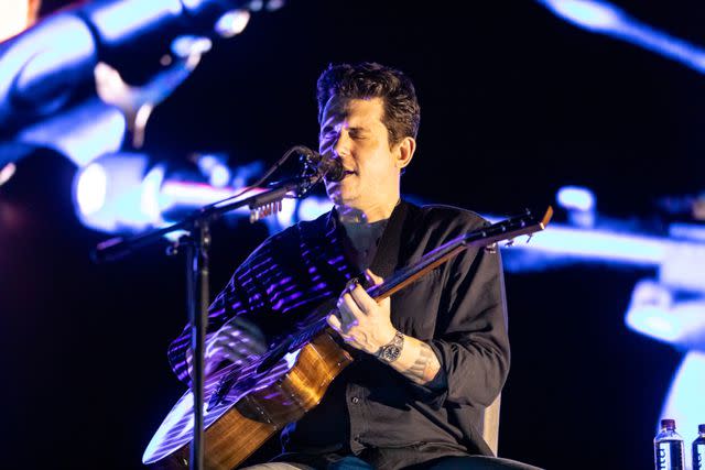 <p>Miikka Skaffari/Getty</p> John Mayer performing in San Francisco in November 2023