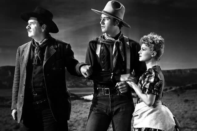 <p>Everett</p> George Bancroft, John Wayne, and Claire Trevor in ‘Stagecoach’