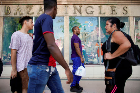 People walk in a shopping zone in downtown Havana, Cuba, May 10, 2019. REUTERS/Alexandre Meneghini