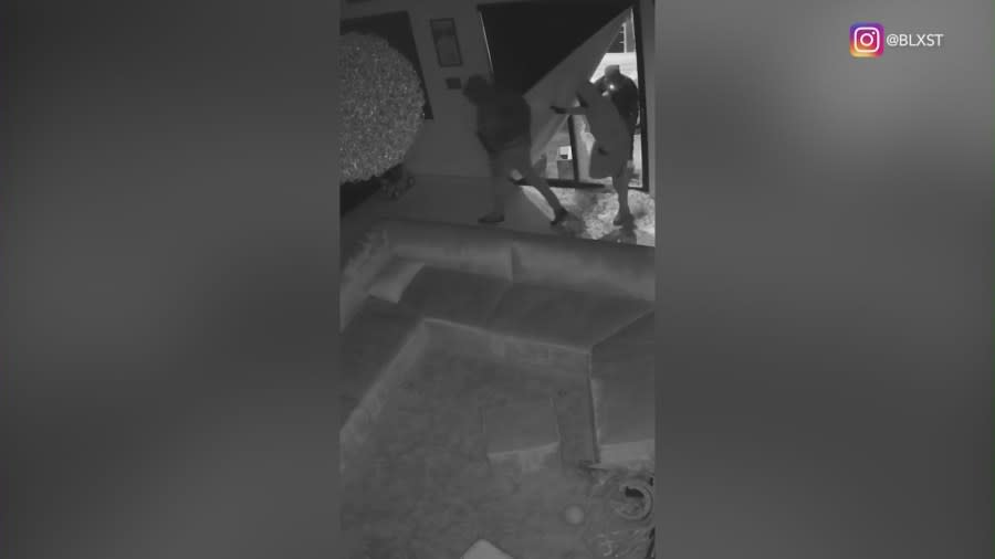 Video posted by rapper Blxst shows three suspects breaking into his Encino home. (IG/@blxst)