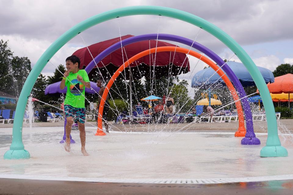 Children enjoy water activities at Wayne County Family Aquatic Center on Friday, July 21, 2023. 