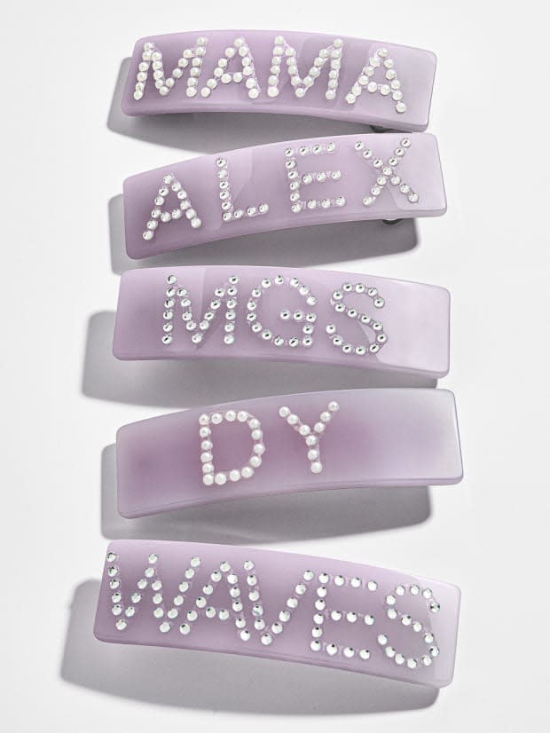 Baublebar Personalized Hair Clip in Lilac, $24, <a href="https://rstyle.me/+IG-L63M2-En-xjdoD-I5Cw" rel="nofollow noopener" target="_blank" data-ylk="slk:available here;elm:context_link;itc:0;sec:content-canvas" class="link ">available here</a>.