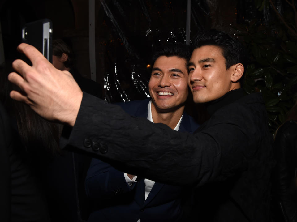 Actors Henry Golding (left) and Alex Landi at the 2018 GQ Men of the Year Party in Beverly Hills, California. (Photo: Getty Images for GQ)