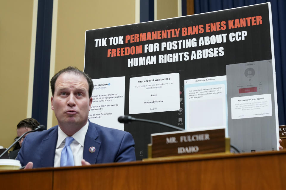 FILE - Rep. August Pfluger, R-Texas, questions TikTok CEO Shou Zi Chew during a hearing of the House Energy and Commerce Committee, on the platform's consumer privacy and data security practices and impact on children, March 23, 2023, on Capitol Hill in Washington. (AP Photo/Jacquelyn Martin, File)