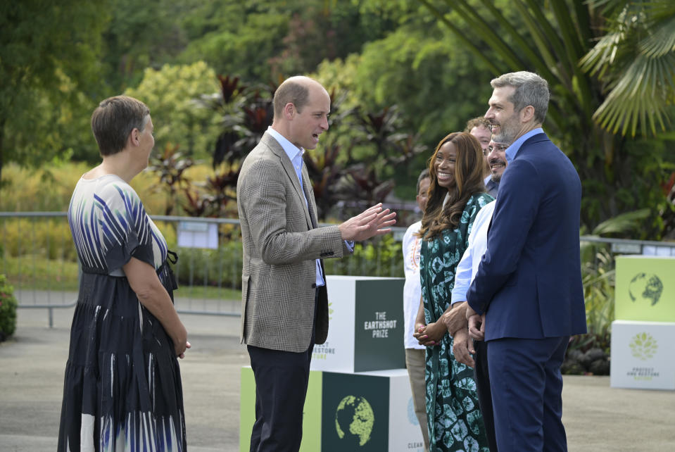 Britain's Prince William meet the 2023 Earthshot Prize finalists at the base of the Supertrees at the Gardens by the Bay park in Singapore, Tuesday, Nov. 7, 2023. (Caroline Chia/Pool Photo via AP)