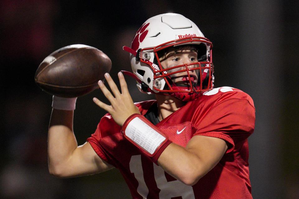 Beechwood's Cash Harney (18) prepares to throw during a KHSAA high school football game against the Simon Kenton Pioneers at Beechwood High School Friday, Sept. 9, 2022, in Fort Mitchell, Ky.