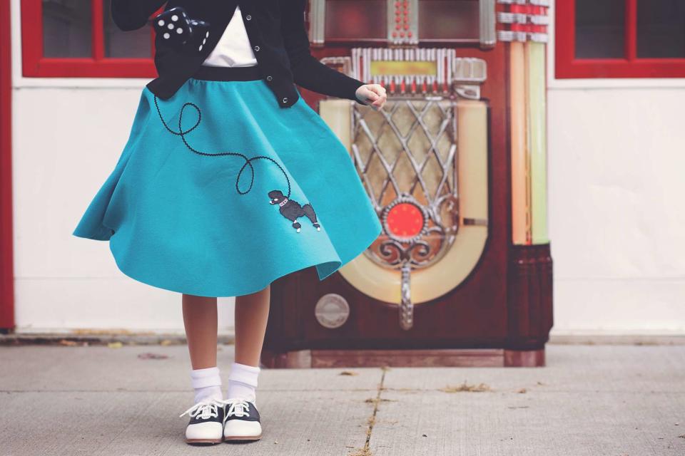 <p>Getty</p> Girl wearing a poodle skirt