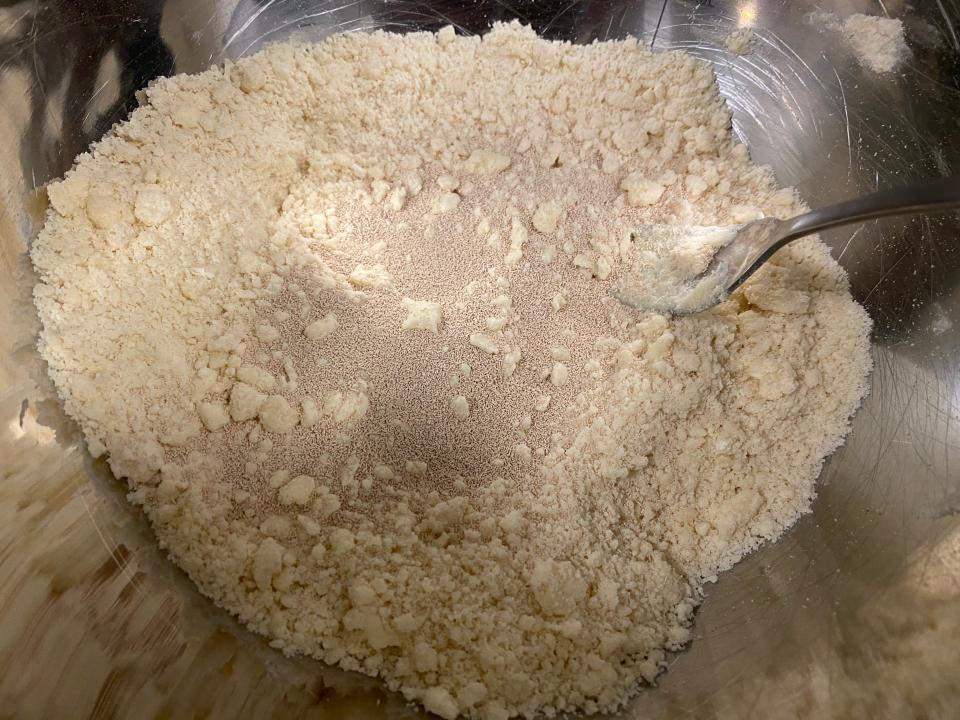 mixing bread ingredients in a bowl