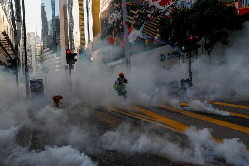 Hong Kong police fire tear gas in feverish start to 22nd weekend of protests in Hong Kong