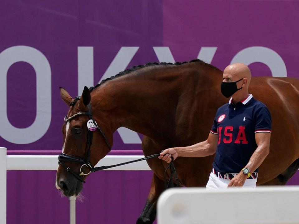 US's Steffen Peters, walks with Suppenkasper, nicknamed Mopsi.