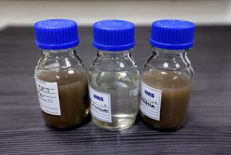 Water samples are seen at Ecopetrol's Castilla oil rig platform, in Castilla La Nueva, Colombia June 26, 2018. Picture taken June 26, 2018. REUTERS/Luisa Gonzalez