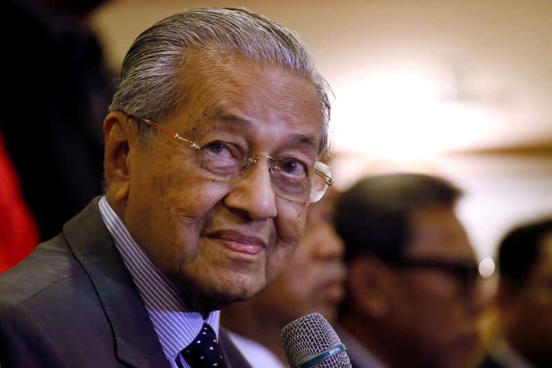 FILE PHOTO: Malaysia's Prime Minister Mahathir Mohamad speaks during a news conference in Putrajaya