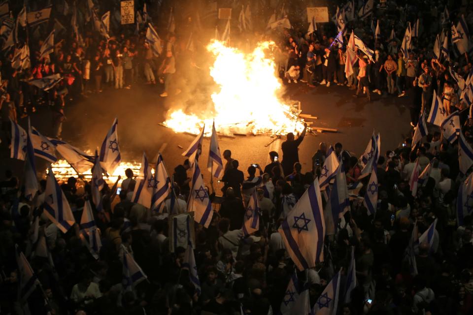Thousands of Israelis take the streets as they block Ayalon highway in response to Prime Minister Benjamin Netanyahuâs surprise sacking of his defense minister Yoav Gallant in Tel Aviv, Israel on March 27, 2023.