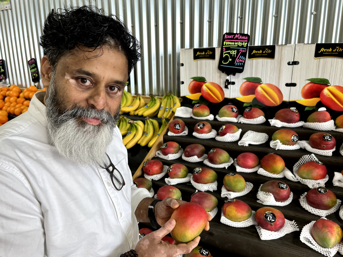 Chef Joe Thottungal, owner of Coconut Lagoon and Thali restaurants, took CBC Radio's Ottawa Morning on a mango shopping trip earlier this week. (Hallie Cotnam/CBC - image credit)