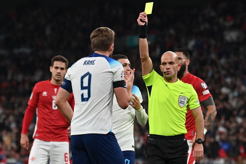 Harry Kane was booked for diving in what looked a harsh decision (AFP via Getty Images)