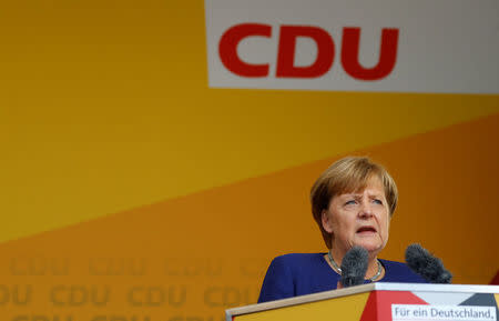 German Chancellor Angela Merkel, a top candidate of the Christian Democratic Union Party (CDU) for the upcoming general elections, speaks during an election rally in Fritzlar, Germany September 21, 2017. REUTERS/Kai Pfaffenbach