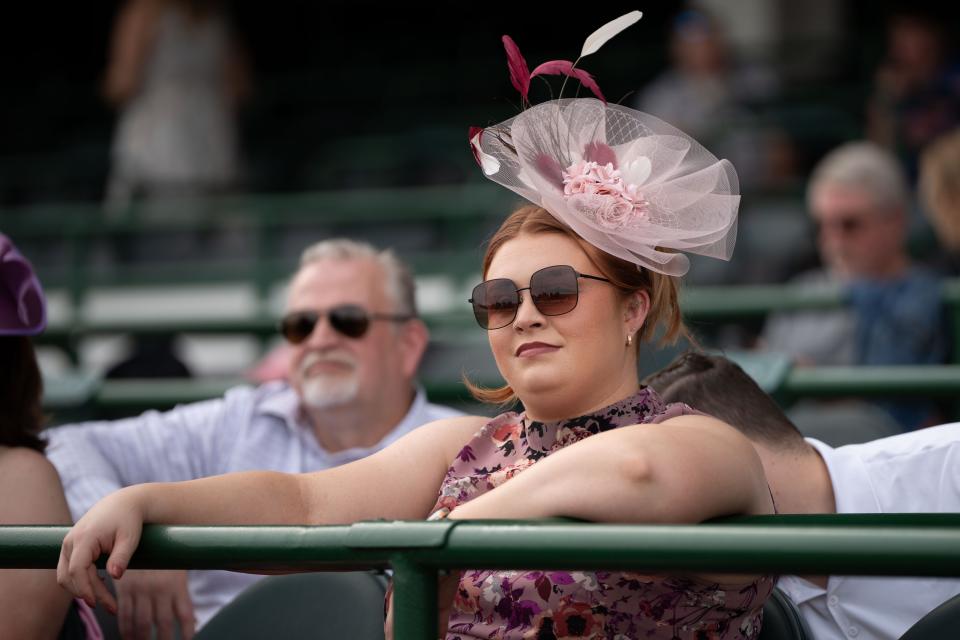 Hannah Allen waits for the first race of Churchill Downs’ Opening Night to start on Saturday, April 27, 2024.