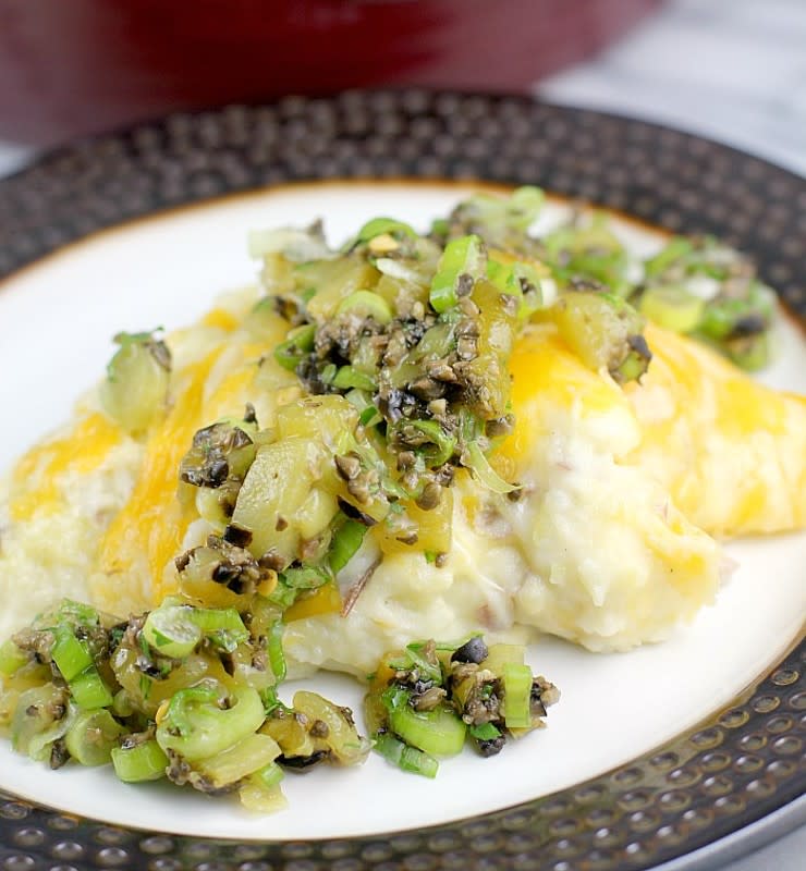 <p>Erica's Recipes</p><p>Creamy mashed potatoes loaded with cheese, garlic and hatch green chile, then topped with olive, onion and more green chile for an awesome tapenade-ish kinda vibe.</p><p><strong>Get the recipe: <a href="https://ericasrecipes.com/hatch-green-chile-mashed-potatoes/" rel="nofollow noopener" target="_blank" data-ylk="slk:Hatch Green Chile Mashed Potatoes;elm:context_link;itc:0;sec:content-canvas" class="link rapid-noclick-resp">Hatch Green Chile Mashed Potatoes</a></strong></p><p><strong>Related: <a href="https://parade.com/1158481/kristamarshall/crock-pot-potato-recipes/" rel="nofollow noopener" target="_blank" data-ylk="slk:35 Set It and Forget It Crock Pot Potato Dishes;elm:context_link;itc:0;sec:content-canvas" class="link rapid-noclick-resp">35 Set It and Forget It Crock Pot Potato Dishes</a></strong></p>