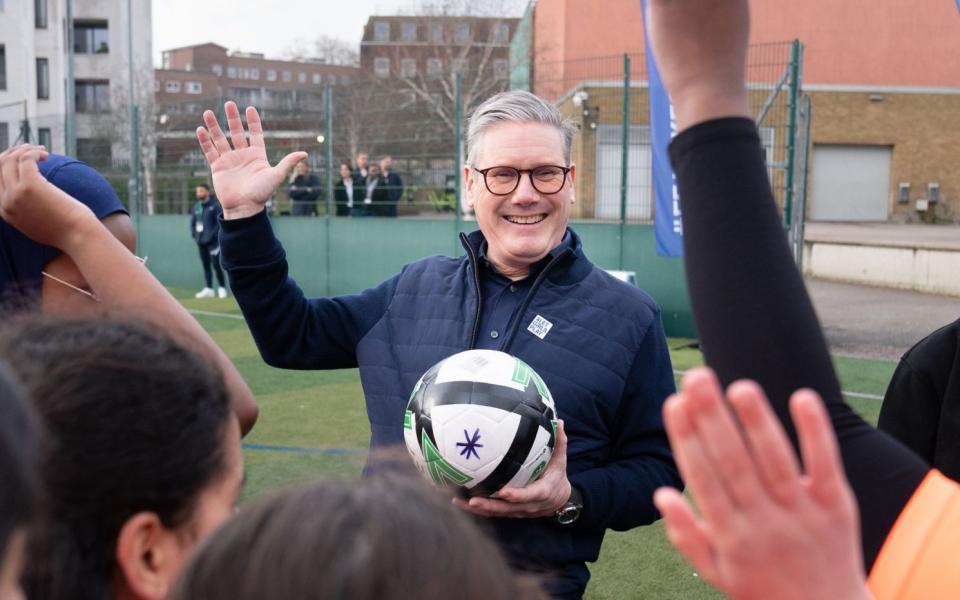 Labour leader Sir Keir Starmer and Lioness Fara Williams during a visit to Haverstock School in Chalk Farm, north London