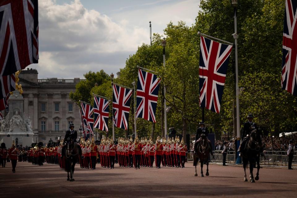 Guards escort the coffin of Queen Elizabeth II (Copyright 2022 The Associated Press. All rights reserved)