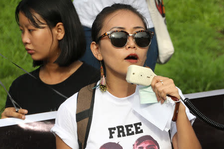 FILE PHOTO: Thinzar Shun Lei Yi speaks at a march for press freedom in Yangon, Myanmar, September 1, 2018. Picture taken September 1, 2018. REUTERS/Ann Wang