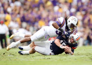 BATON ROUGE, LA - OCTOBER 22: Derrick Bryant #36 of the LSU Tigers sacks quarterback Clint Moseley #15 of the Auburn Tigers during the game at Tiger Stadium on October 22, 2011 in Baton Rouge, Louisiana. (Photo by Jamie Squire/Getty Images)