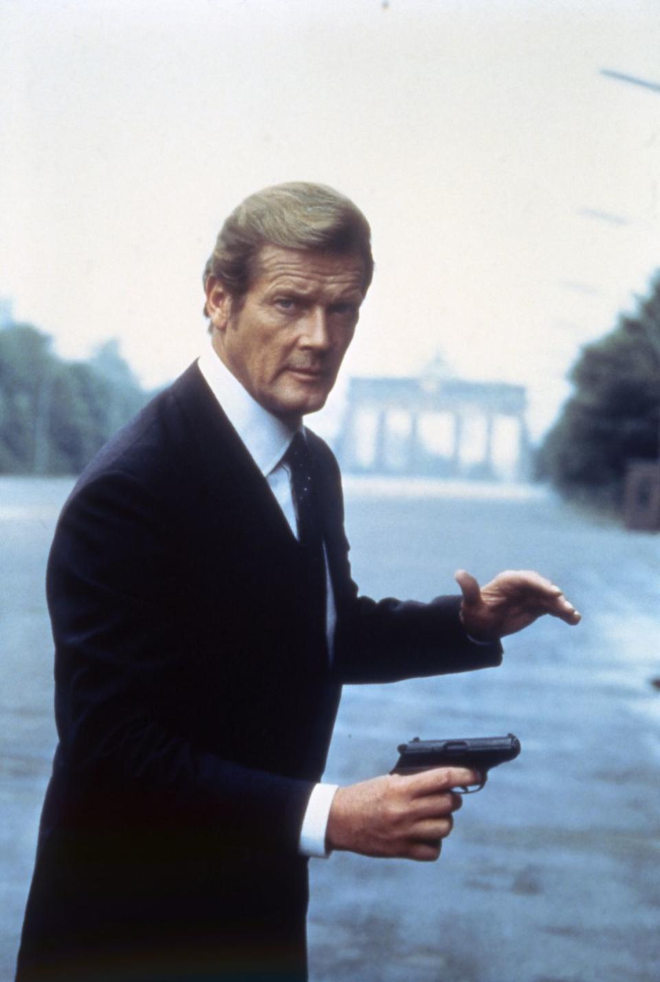 sir roger moore on the set of octopussy