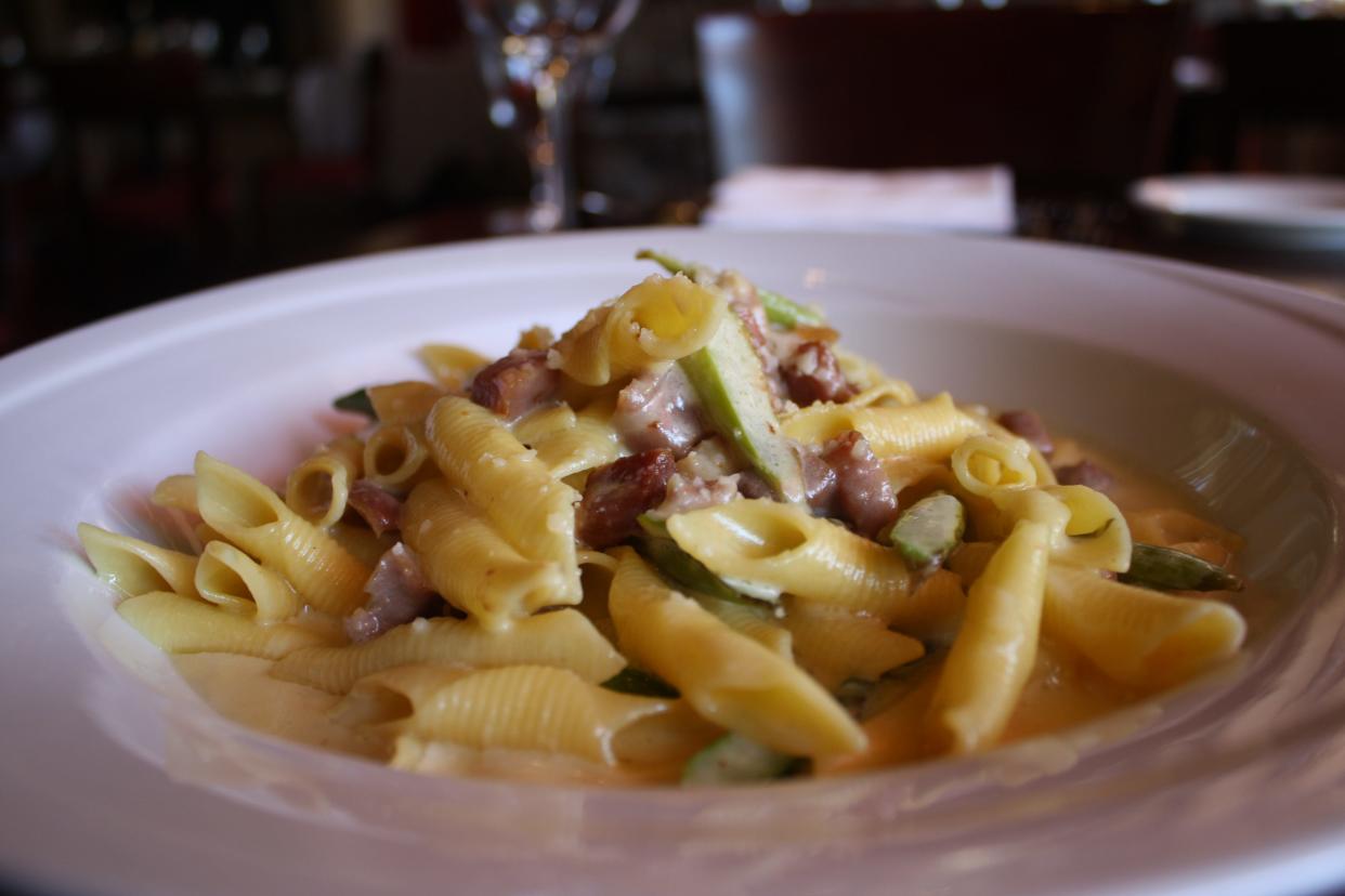 Garganelli with truffle cream, asparagus and prosciutto, a Catherine Lombardi house special.