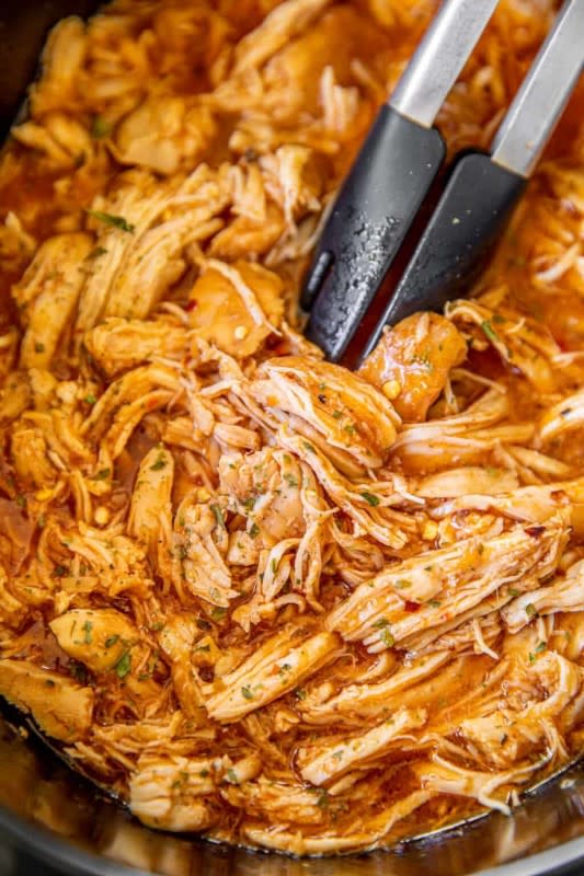 <p>Plain Chicken</p><p>The added Italian Dressing gives a zesty flavor and taste to this tender shredded chicken. </p><p><strong>Get the Recipe: <a href="https://www.plainchicken.com/zesty-slow-cooker-bbq-chicken/" rel="nofollow noopener" target="_blank" data-ylk="slk:Slow Cooker Zesty BBQ Chicken;elm:context_link;itc:0;sec:content-canvas" class="link ">Slow Cooker Zesty BBQ Chicken</a></strong></p>