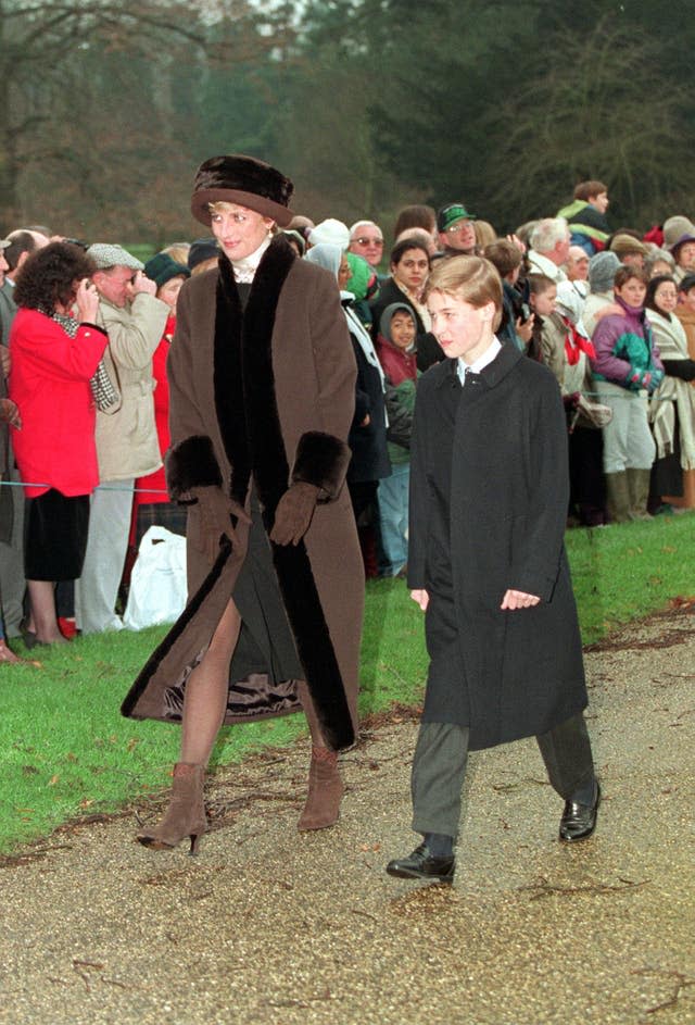 Diana with a young Prince William (PA)